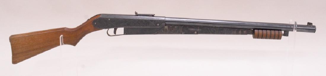 Vintage Daisy Model 25 Pump Action BB Gun: Vintage Daisy variant 7 model 25 pump action bb gun with 6 groove forearm, wood stock, and etched receiver. Excellent condition with lots of case color on lever.