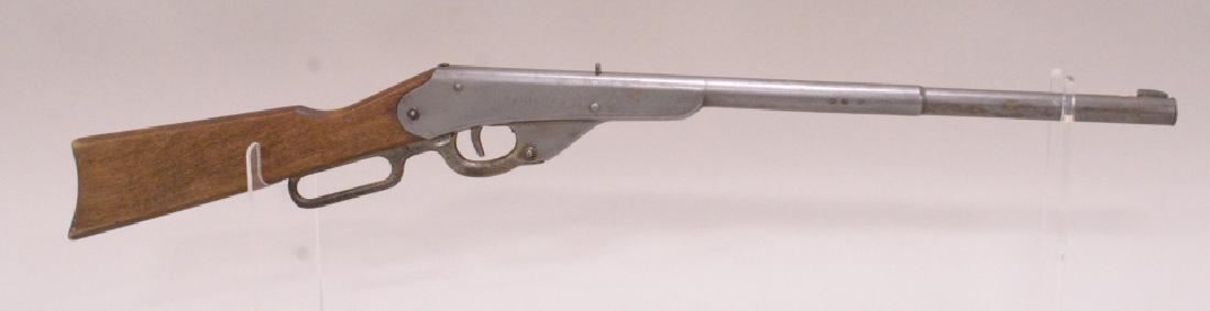 Vintage Daisy Model H Lever Action BB rifle: Vintage Daisy model H lever action,350 shot bb rifle. Good condition. Does have plate loss and hairline crack in stock.