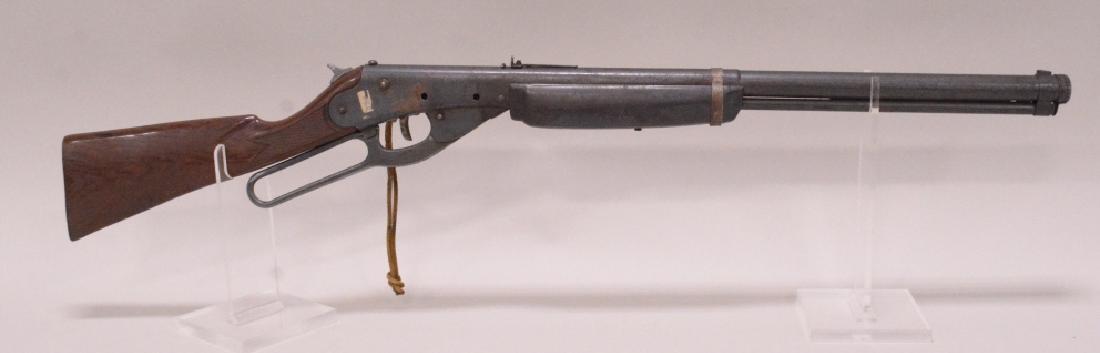 Daisy Model 97 Lever Action BB Rifle: Nice vintage Daisy model 97 lever action bb rifle with plastic stock. Nice condition with wear and light surface rust from use and age.