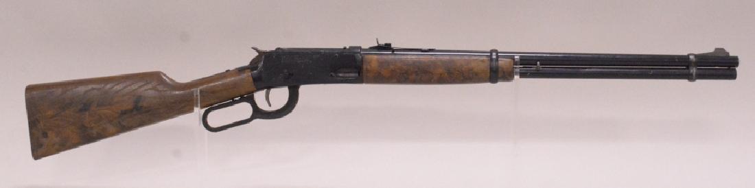 Daisy Model 1894 Lever Action BB Rifle: Nice Daisy model 1894 lever action BB rifle with plastic stock. Nice condition with some wear from use and age.