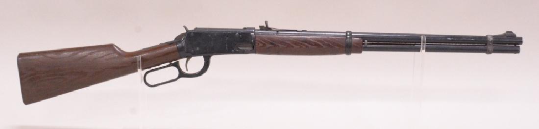 Daisy Model 1894 Lever Action BB Gun: Daisy model 1894 lever action BB rifle with plastic stock. Nice condition with wear andlight surface rust.