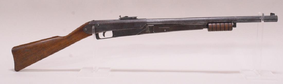 Vintage Daisy Model 25 Pump Action BB Gun: Vintage Daisy model 25 short throw pump action bb gun with 5 groove forearm. Nice condition with age appropriate wear.