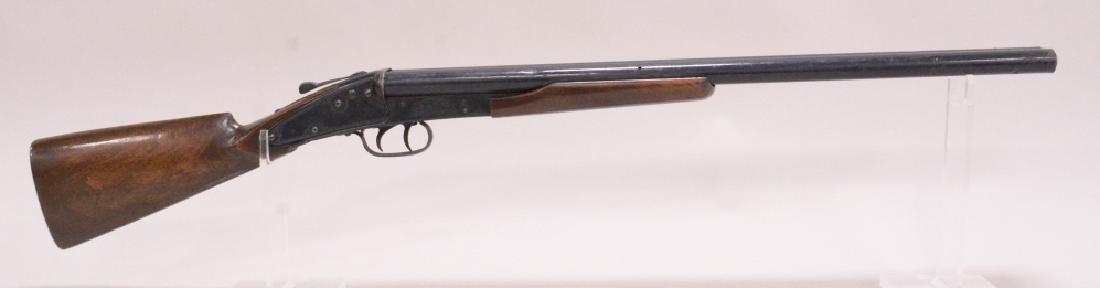 Vintage Daisy Model 410 Double Barrel Pop Gun: Vintage Daisy model 410 double barrel pop gun with wood stock. Nice condition with age appropriate wear.