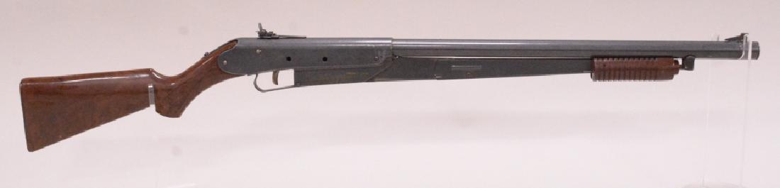 Daisy Model 25 Pump Action BB Rifle: Nice vintage Daisy Model 25 pump action bb rifle with plastic stock. Very nice condition with light wear from play and age.