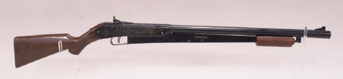 Daisy Model 25 Pump Action BB Rifle: Nice Daisy Model 25 pump action bb rifle with plastic stock. Very nice condition with light wear from play and age.