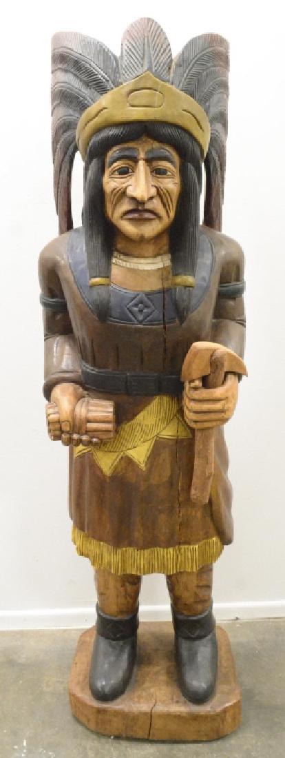 Hand Carved Cigar Store Indian: Very nice hand carved cigar store indian. Displays extremely well with nicely carved details,hatchet, and cigars. Measures approximately 70" tall by 18" across by 14" deep.