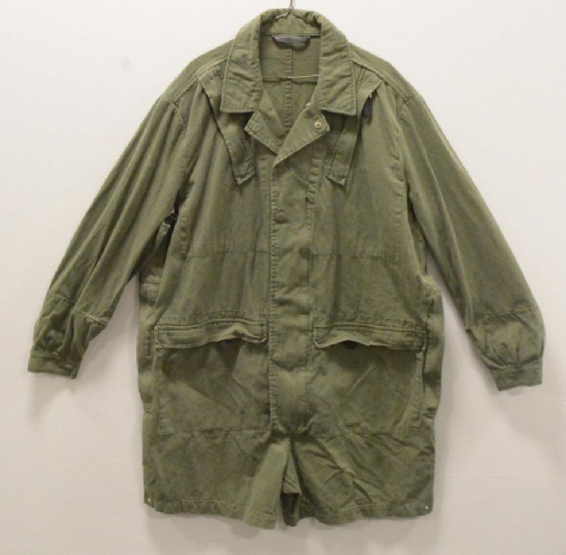 Museum Repro WWII German Luftwaffe Jump Smock: Museum quality reproduction WWII German Luftwaffe Paratrooper second model speckled green "Step In" jump smock. Comes with star snaps. Size Large-Extra Large.