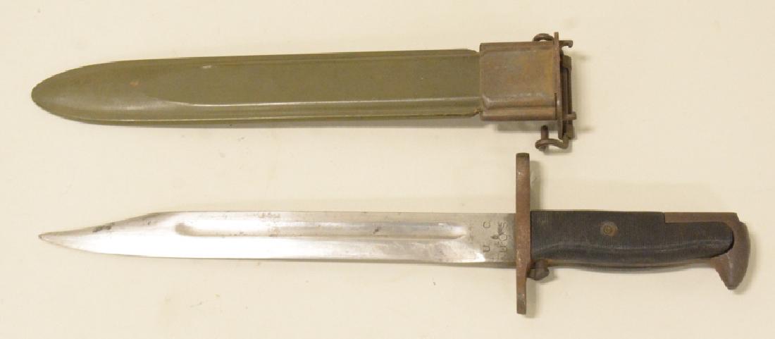 WWII US M1 Garand Bayonet w/ Scabbard: Nice WWII era US military M1 Garand bayonet with scabbard. Marked U.C. on blade. Nice condition with light surface rust and wear from use and age. Blade measures approximately 9.75" long. Overall with