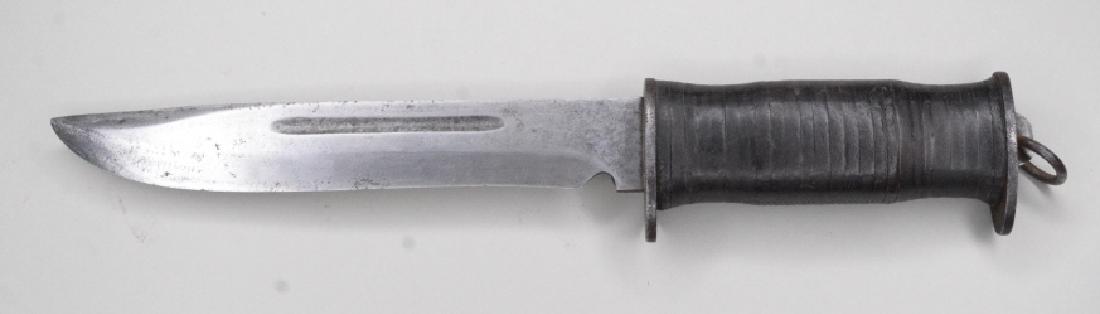 WWII Era EG Waterman Combat Survival Knife: Nice WWII era Waterman combat survival knife. Nice condition with wear on blade. Leather grip. No markings. Blade measures approximately 7" long, overall length 11.5".