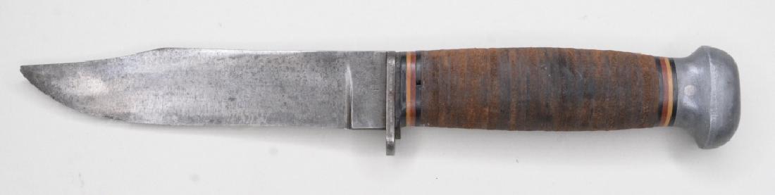 WWII Era RH PAL-35 Mark 1 Fighting Knife: Nice WWII era RH Pal-35 Mark 1fighting knife. Has some small chips on edge of blade. Leather grip. Marked "RH PAL-35" and "U.S.A MARK -1" Blade measures approximately 5" long, overall length 10".