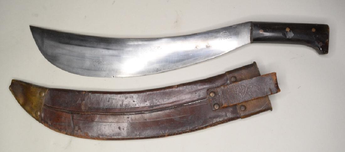 Vintage Collins & Co. Machete No.1005: Nice vintage used Collins machete with sheath. Knife is in used condition with a chip on the edge of blade. Sheath has some wear. Blade measures approximately 15" long, overall length 20.5".