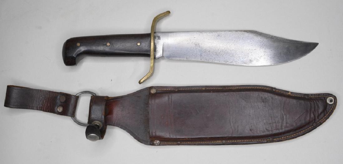 Vintage Western Bowie Knife With Sheath: Nice large Western Bowie Hunting Knife with sheath. Knife is in good used condition with the original sheath. Blade measures approximately 9.25" long, overall length 15.5".