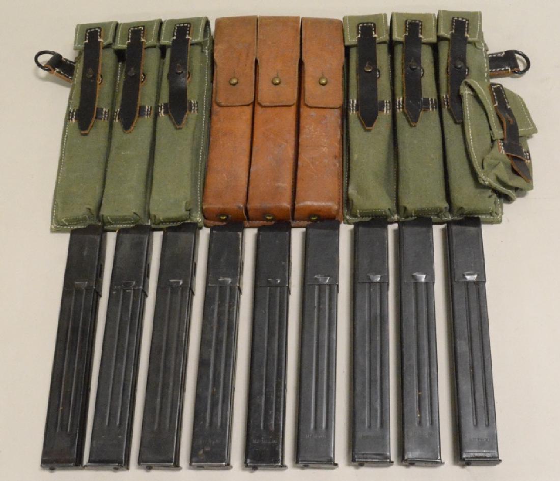WWII German MP 40 Magazines and Pouches: Nice lot of WWII German MP 40 magazines and pouches. Lot includes 9 WII era german MP 40 magazines with Nazi eagle hallmarks. ALso included are three reproduction WII MP40 magazine pouches, and one le