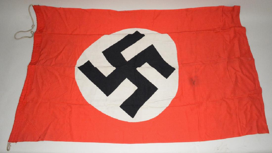 WWII German Flag 48x30: Nice condition with staining and discoloration. No rips or tears. Measures approximately 48" across by 30" tall.