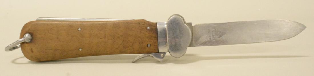 WWII German Luftwaffe Paratrooper Gravity Knife: Nice WWIII German Luftwaffe paratrooper gravity knife. Very nice condition with som expeted wear. Blade is marked "SMF Solingen Rostfrei". Measures approximatly 6" long without blade. With blade exten