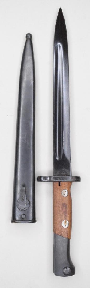 Yugoslovia M1948 Bayonet: Nice Yugoslvia M1948 mauser Bayonet. The bayonet comes with metal scabbard and is in very nice used condition. Bayonet and scabbard have matching numbers. Blade measures 9.75" long and overall measure