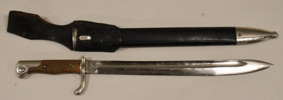 WWII German M1898 Mauser Bayonet w/ Scabbard: Nice WWII German M1898 Mauser bayonet with scabbard. NIce condition with wear from use and age. The finish to the leather frog has wear. Blade is marked "C.E.". Blade measures approximately 14 1/2" lo