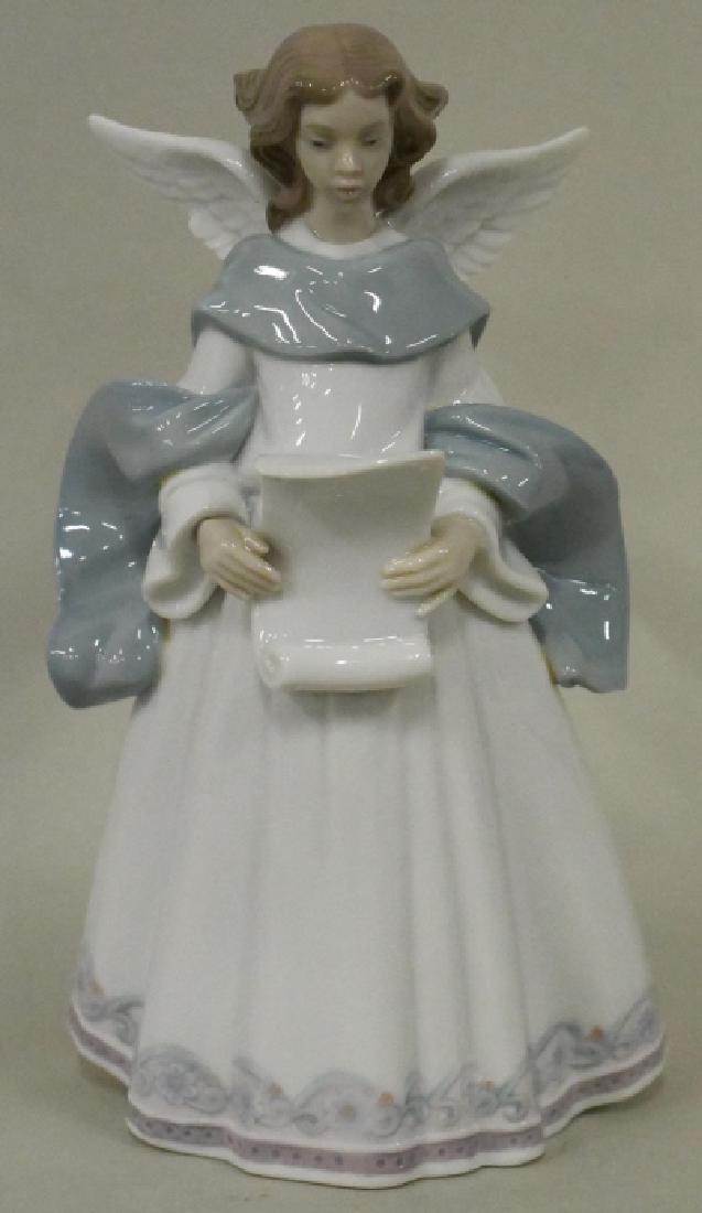 Lladro "Rejoice" Limited Edition Tree Topper #6321: The sold out angel tree topper measures 8.25" tall and is in mint condition in the original box.