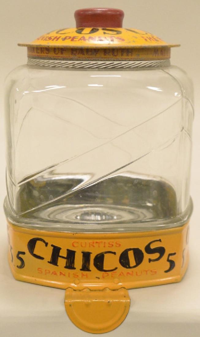 Curtis Chicos Spanish Peanust Glass Jar: Glass Jar with a tin lid and base. great graphics with some touch up paint on base.