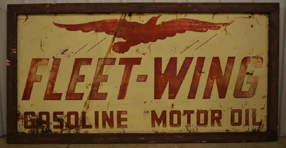 SST Fleet-Wing Motor Oil Advertising Sign: Nice worn condition with paint loss, rust, and discoloration. Displays very well with a great worn look . Measures approximatley 72 1/2" across by 37" tall.