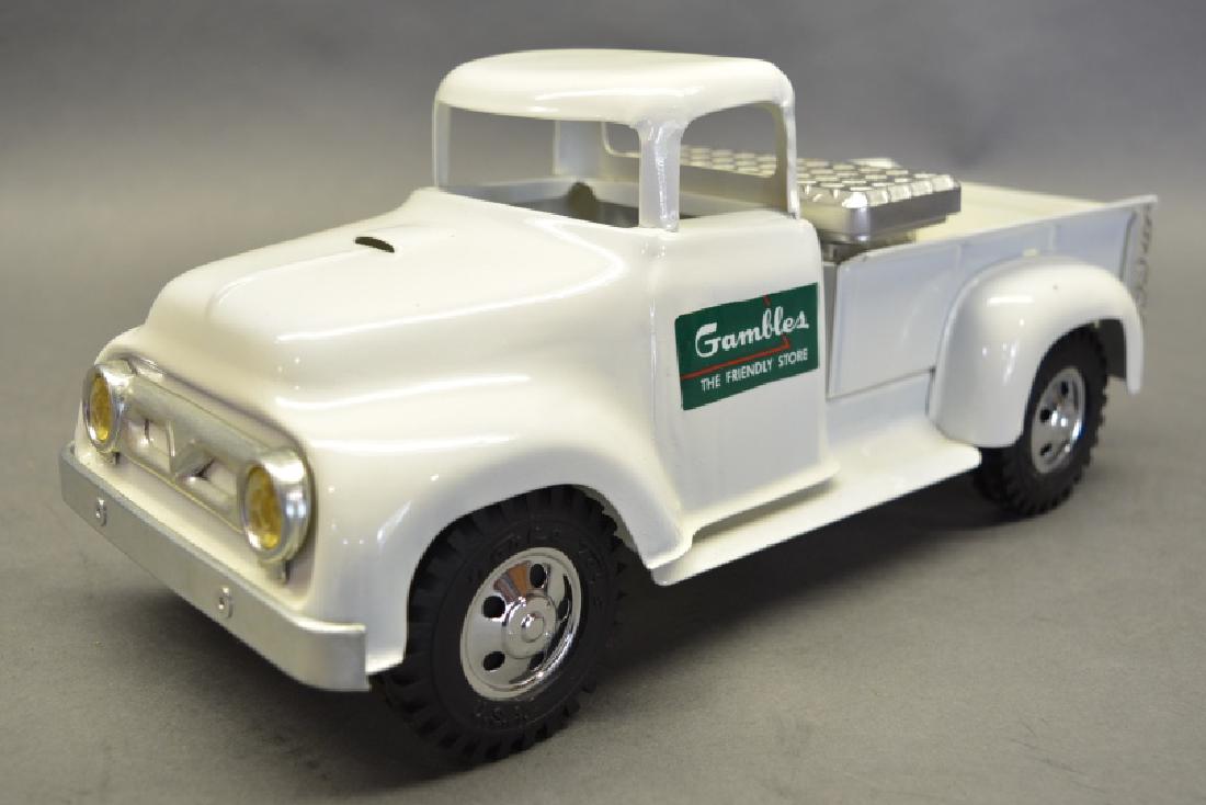 Restored Tonka Gambles Pick-Up Truck: Round fender pressed steel Tonka Gambles Pick-Up truck with private label Gambles and TSC Tractor Supply Co on the back of the cab. Very nice professional restoration excellent condition. Measures app
