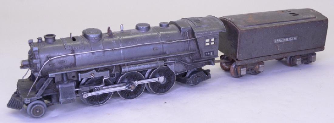 Lionel 224E Steam locomotive With Whistle Tender: 2-6-2. Lionel 224E Steam locomotive with Whistle Tender. In nice condition with light paint wear. Set is untested.