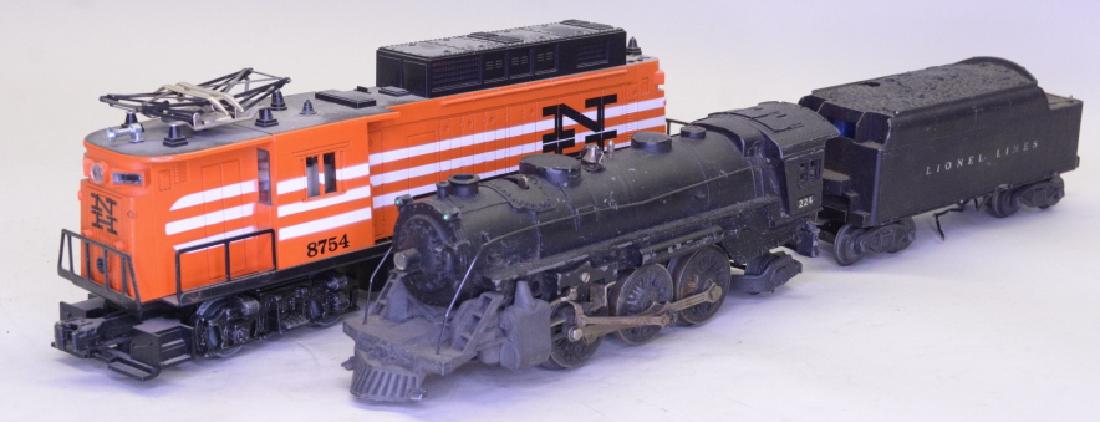 Lot of 2 Lionel Locomotives With Whistle Tender: Mixed lot of Lionel trains. Lot includes New Haven Rectifier Electric Locomotive, O-gauge 224 locomotive, and 6466 whistling tender. Nice condition with some expected wear. Tender and locomotives are 