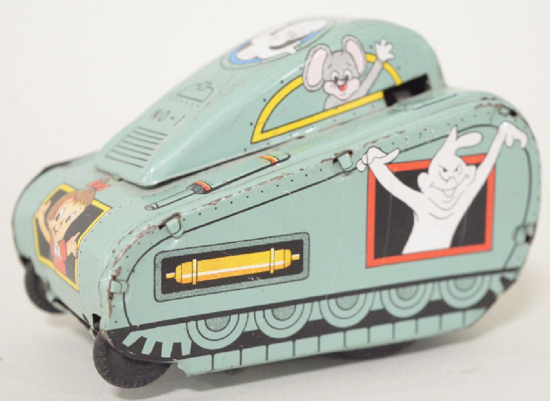 Line Mar Tin Litho Wind Up Casper Rollover Tank: Nice vintage Line Mar tin litho wind up Casper rollover tank. Very nice condition with very light wear from play and age. Wind up works. Measures approximately 3 3/4" across.