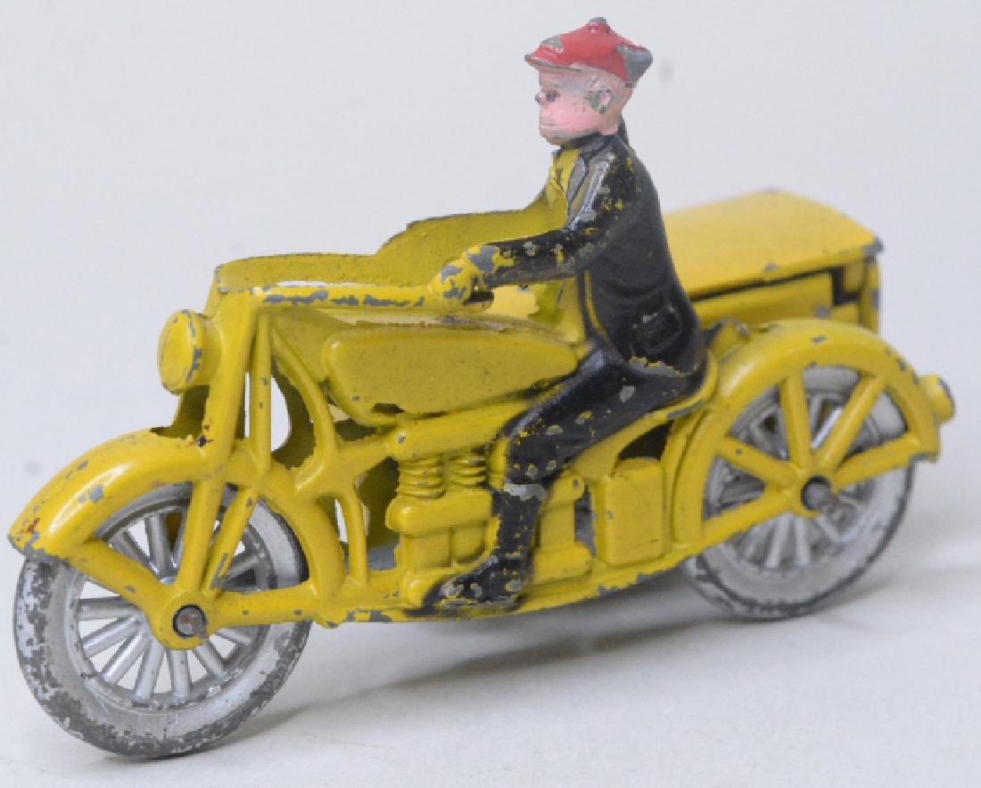 Toosie Toy Die Cast Smitty Delivery Motorcycle: Nice pre war Toosie Toy die cast Smitty Delivery Motorcycle . Very nice condition, with some paint loss from play and age. Wind up works, but rollover action needs work. Measures approximately 3.5" ac
