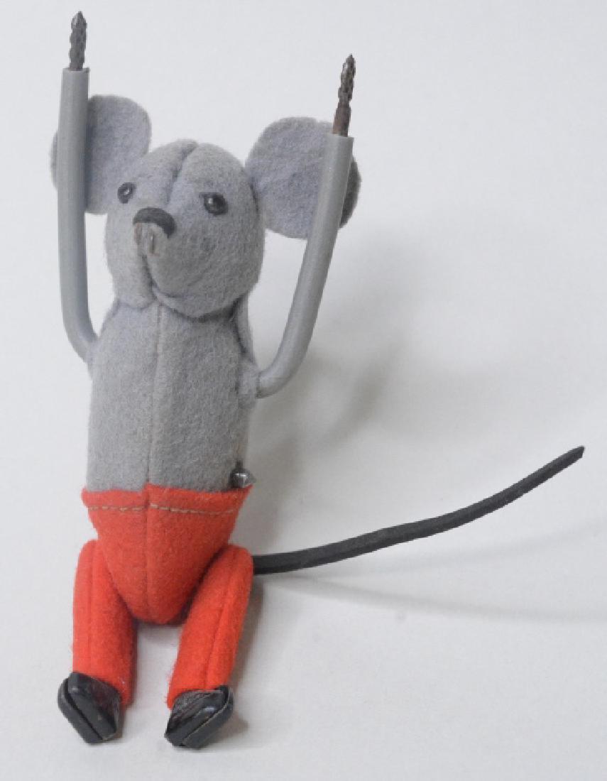Schuco Wind-Up Acrobat Mouse: Vintage Schuco wind up Acrobat Mouse. Nice condition with some light wear. Missing his hands. Missing key, untested. Measures approximately 4.5" tall.