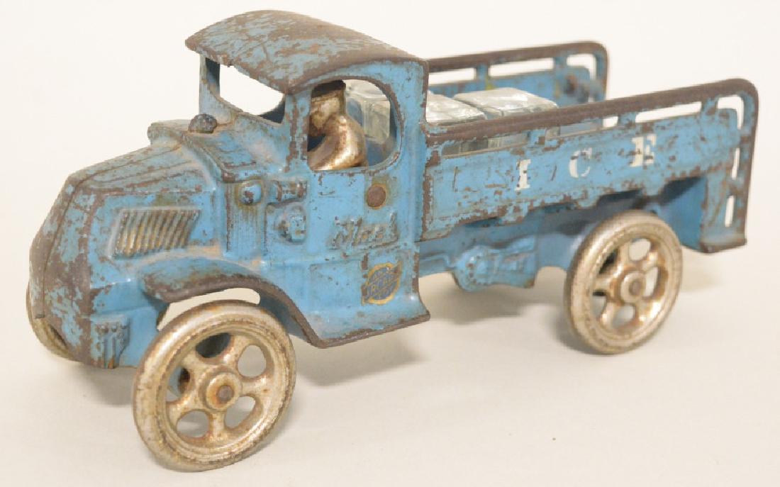 Arcade Cast Iron Mack Ice Truck: Nice cast iron Arcade Mack ice truck with ice blocks. Nice condition with paint loss and wear. Includes three icce blocks. Measures approximately 8" long.