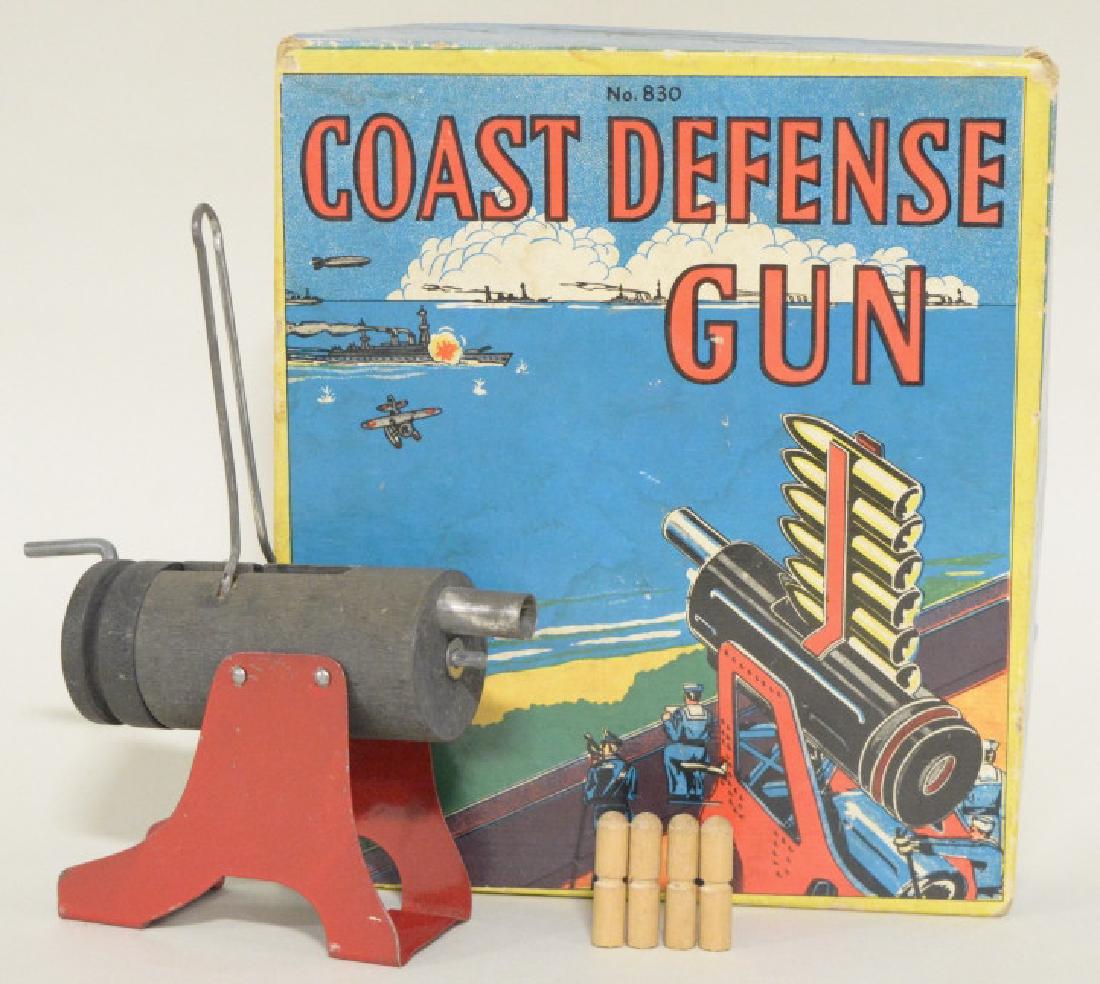 Vintage Baldwin MFG Coast Defense Gun No.830: Nice vintage Baldwin Mfg. Coast Defense Gun in original box No. 830. Nice condition. Includes gun and four projectiles. Box is in good condition but doe shave wear and damage from age. Box measures ap