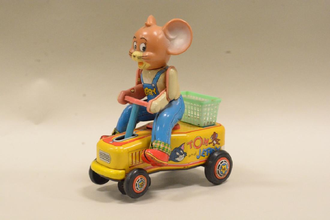 Modern Toys Japan Tom And Jerry Battery Op Handcar: Very nice vintage Modern Toys Japan Tom and Jerrry tin litho battery operated "Jerry" handcar. Very nice conditionwith light wear from use and age. battery compartment is clean but untested. Measures