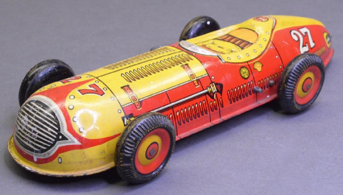Marx Tin Litho wind up Indy style Race Car #27: Louis Marx & Co. tin litho wind up Indy style Race Car #27. In nice condition with some play wear. Missing driver. Wind up works with a little help.