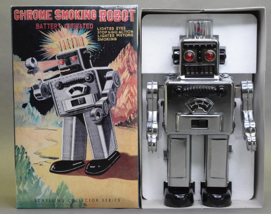 Schylling Chrome Smoking Robot: Contemporary Schylling battery operated Chrome Smoking Robot new in the box. Limited Numbered Edition #0122 with certificate of authenticity. Box in nice condition with light wear. Untested.