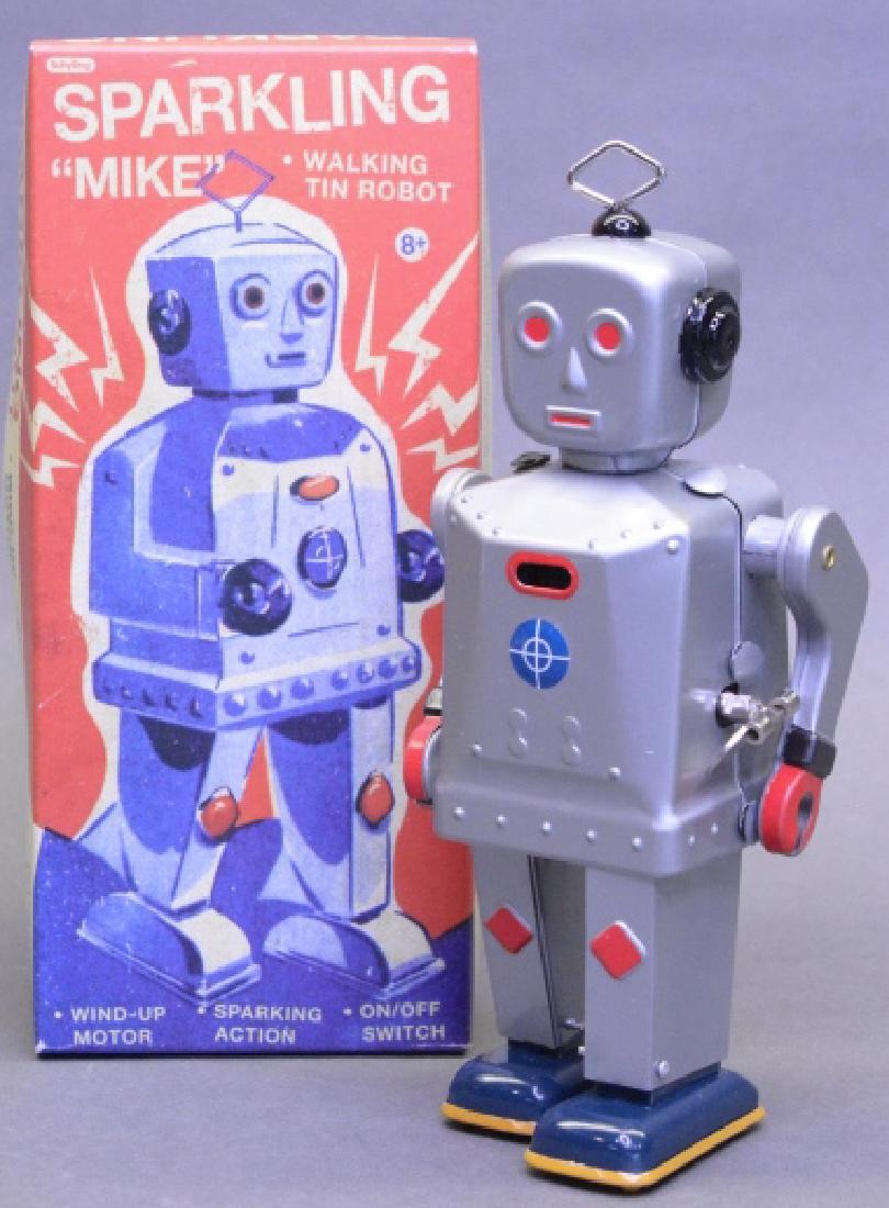 Schylling Tin Litho Wind Up Sparkling Mike Robot: Contemporary tin litho Up Sparkling Mike Robot. New in the box. Box in nice condition with some wear.