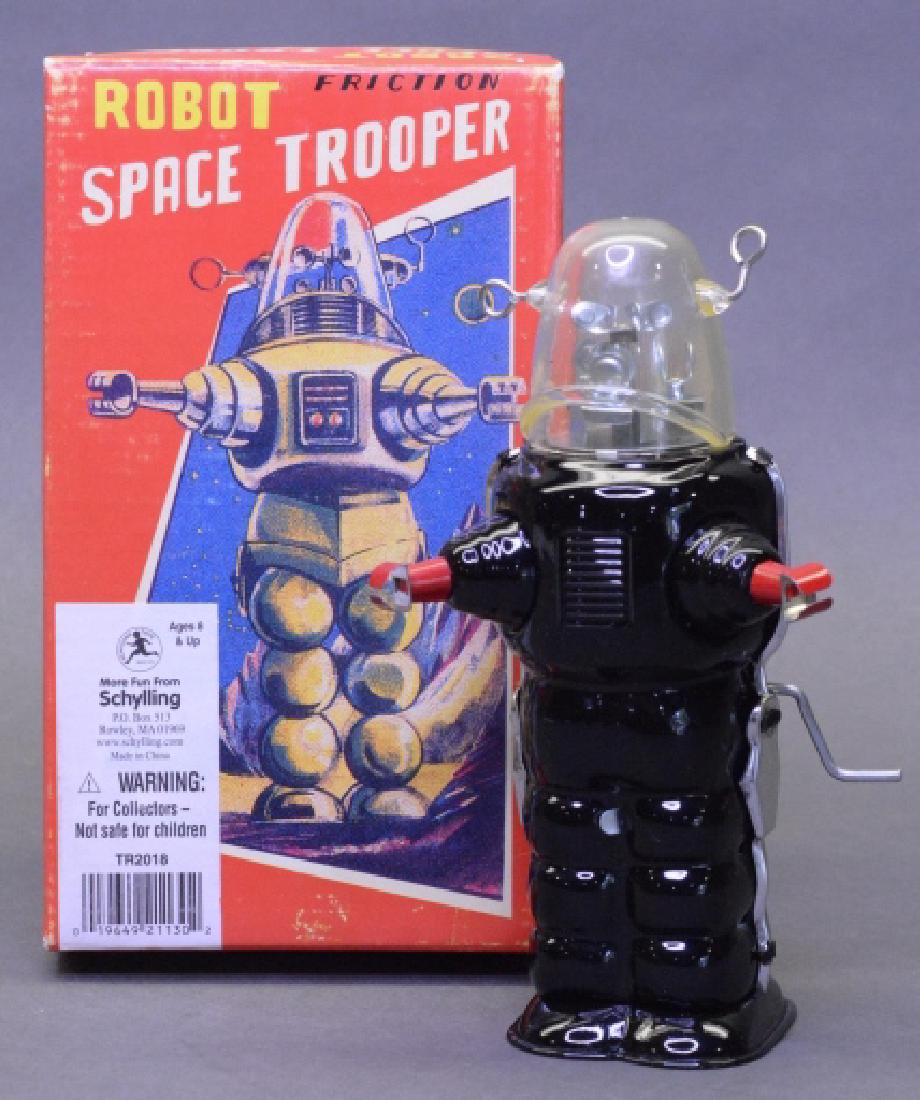 Schylling Tin Litho Friction Space Trooper Robot: Contemporary tin litho friction powered Space Trooper Robot. New in the box. Box in nice condition with some wear.