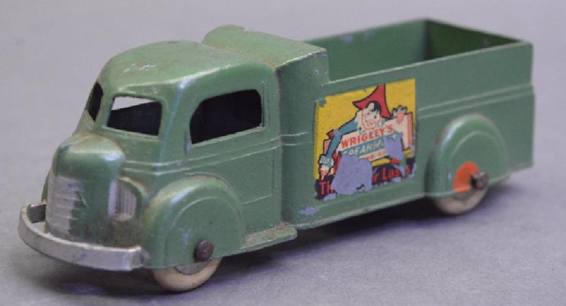 Tootsie Wrigley's Gum Truck: Tootsie Wrigley's Gum truck. Has play wear with paint loss. Truck measures approximately 4.5" long.
