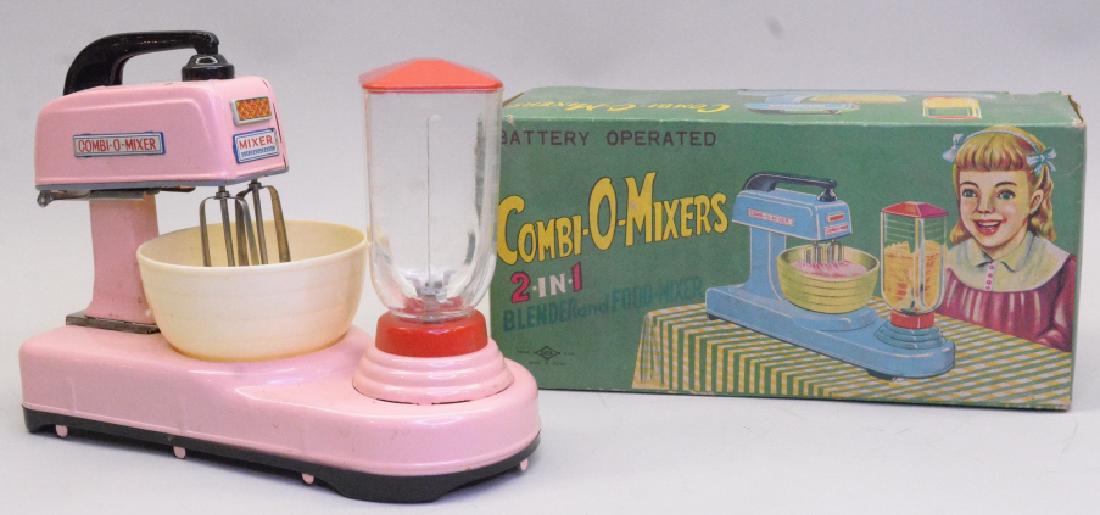 Daiya Toys Combi-O-Mixers 2-in-1 Blender And Mixer: Daiya Toys tin litho battery operated. Combi-O-Mixers 2-in-1 Blender And Food Mixer in the box. In nice condition with the back battery plate rusted. Box is in nice condition with some wear from age a