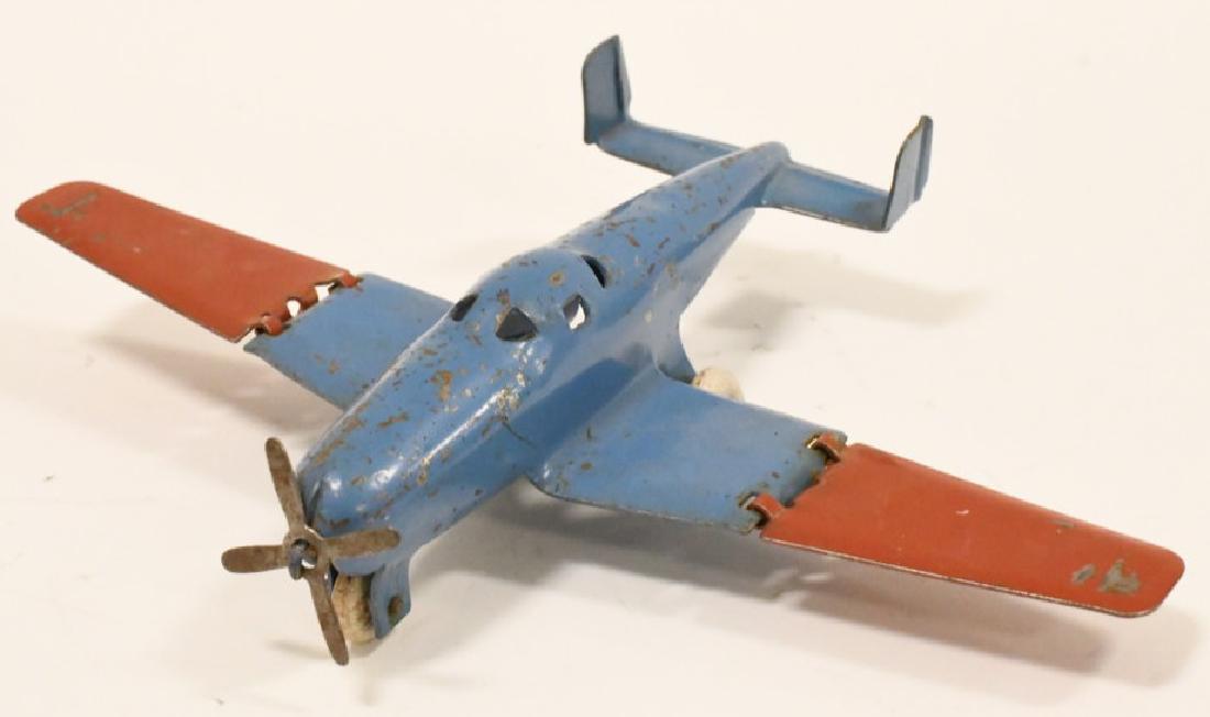 Wyandotte Folding Wing Front Prop Airplane: Nice original folding wing front prop airplane. Nice condition with wear from play and age. Wingspan measures approximately 9" across.