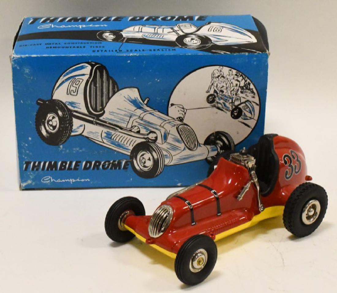 Nylint Contemporary Thimble Drome Champion Racer: Nice Nylint thimble drome racer in box. Nice conditon with light paint wear. It is missing one hub cap screw. Box has wear.