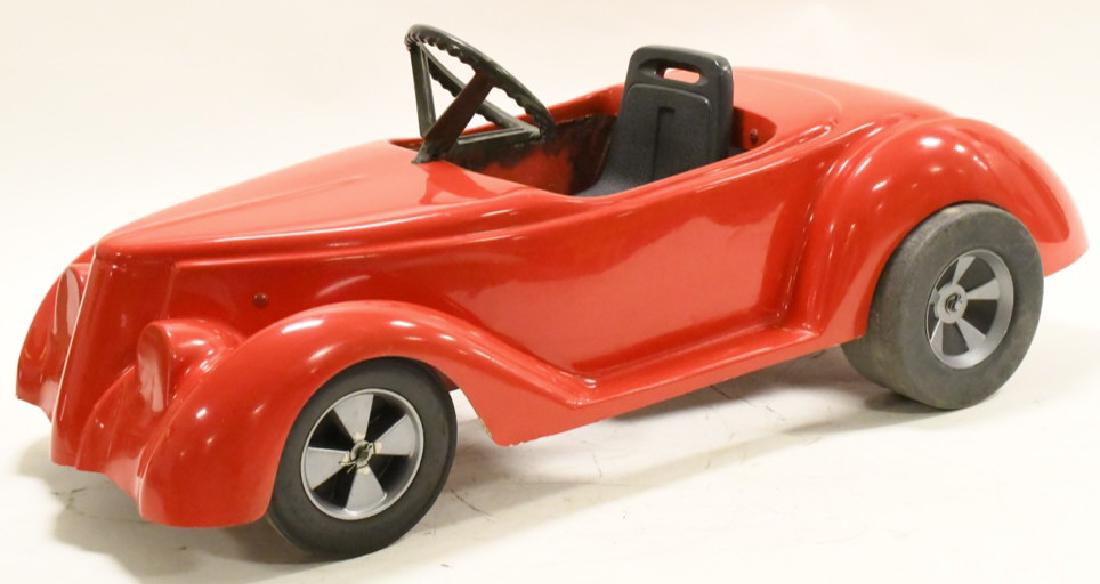 1938 Ford Fiberglass Body Pedal Car: Nice condition 1938 Ford pedal car with a fiberglass body. Measures 45" long. Looks Great!!