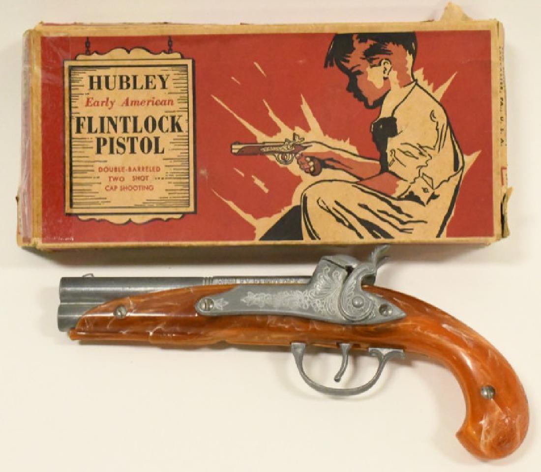 Vintage Hubley Flintlock Cap Gun Pistol In Box: Nice condition vintage Hubley Earley American Double-Barreled Cap Gun Flintlock Pistol #280. The pistol works great and shows little play wear. Comes in the original box. Gun measures 9.25" long overa