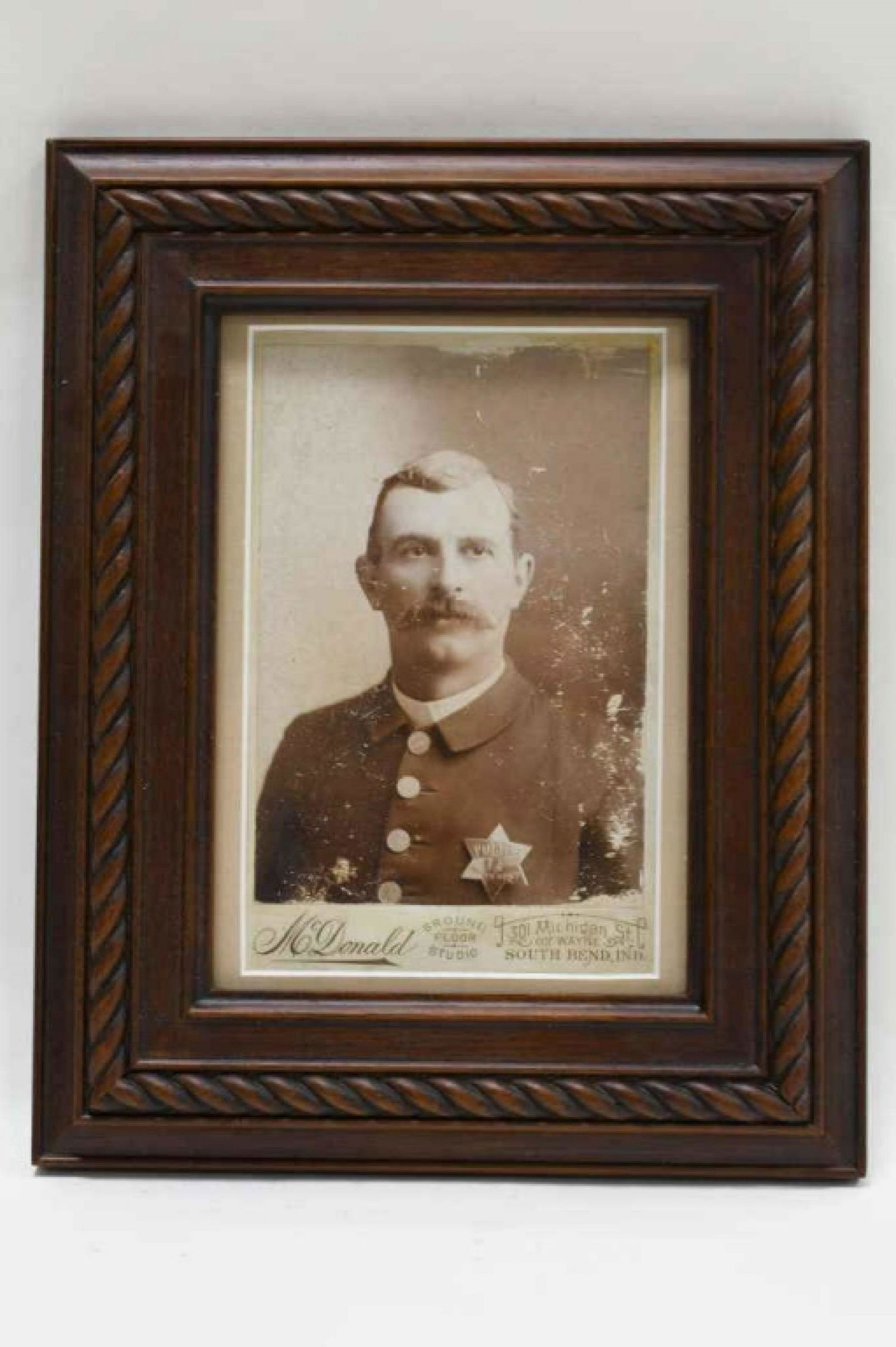 Early Southbend Ind. Framed Police Officer Photo: Nice early Southbend Indiana Police Officer framed photo. Nice condition with scratches and wear from age. Displays well. Overall with frame it measures approximately 10" tall by 8" across.