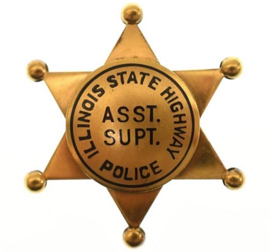Obsolete ILL State Highway ASST SUPT Police Badge: Nice obsolete Illinois State Highway Assistant Superintendent Police badge. Badge is in nice condition with pinback. Back is unmarked. It measures approximately 1-1/2" tall by 1-1/4" across.