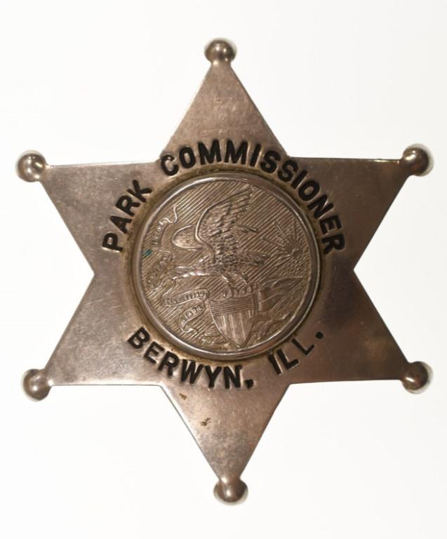 Obsolete Berwyn Illinois Park Commissioner Badge: Nice obsolete six-point star Berwyn Illinois Park Commissioner Badge. Badge is in nice condition with pinback. Back is unmarked. It measures approximately 2-1/2" tall by 2-1/4" across.