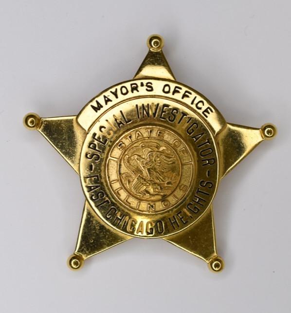 Obsolete East Chicago Heights Investigator Badge: Nice gold-tone five point star East Chicago Heights Illinois Mayor's Office Special Investigator Badge. Maker marked C.H. Hanson on the reverse. The badge is in nice condition with a pinback. Measures