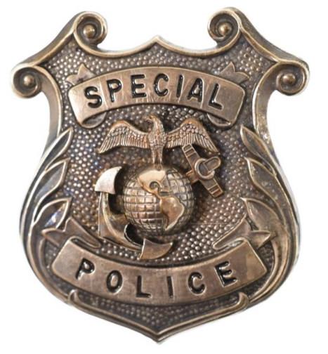 Obsolete U.S. Marines Special Police Badge: Nice obsolete U.S. Marines Special Police Badge. The badge is in nice condition with pinback. Back is maker marked Meyer Inc. Measures approximately 2-1/2" tall by 2-1/8" across.