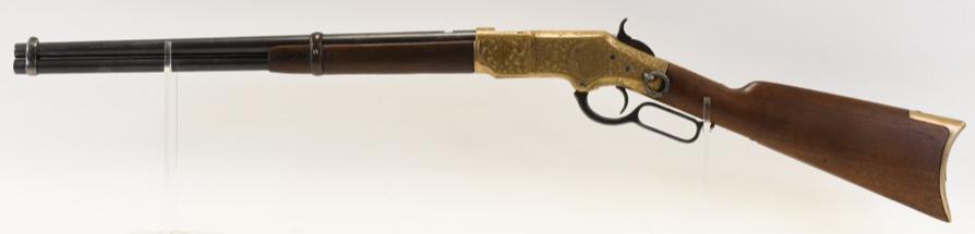 Winchester Model 1866 .44 Cal. Saddle Ring Carbine: Engraved Winchester Model 1866 saddle ring carbine in .44 caliber. The rifle has a 20" round Henry marked barrel and is in good condition with use wear. Engraving features a buffalo and the initials C