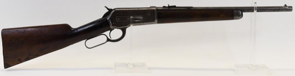 Winchester Model 1886 .33 WCF Trapper Carbine: Winchester Model 1886 Trapper carbine in .33 WCF. The carbine has a 17.5" round barrel and is in good condition with use wear, missing the metal butt plate. Manufactured in 1905. Serial #136009. FFL r